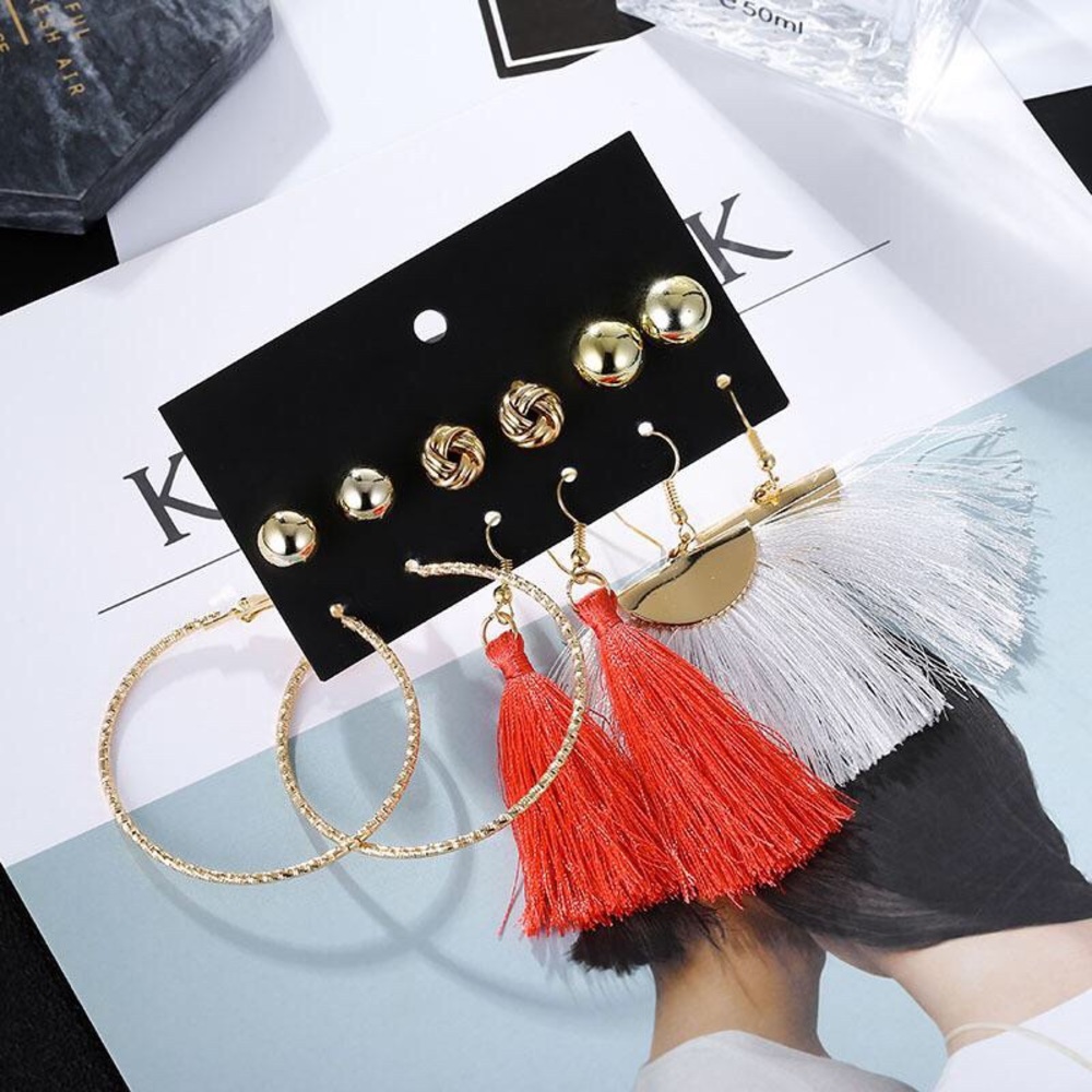 Earring set with statement and stud earrings